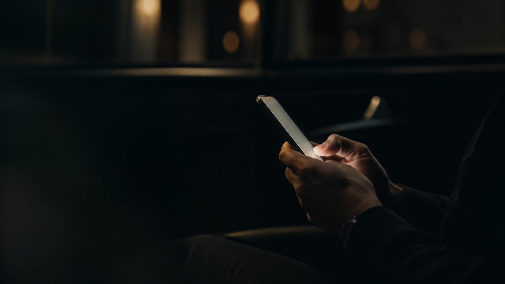 A phone answering an after-hours caller and booking the job